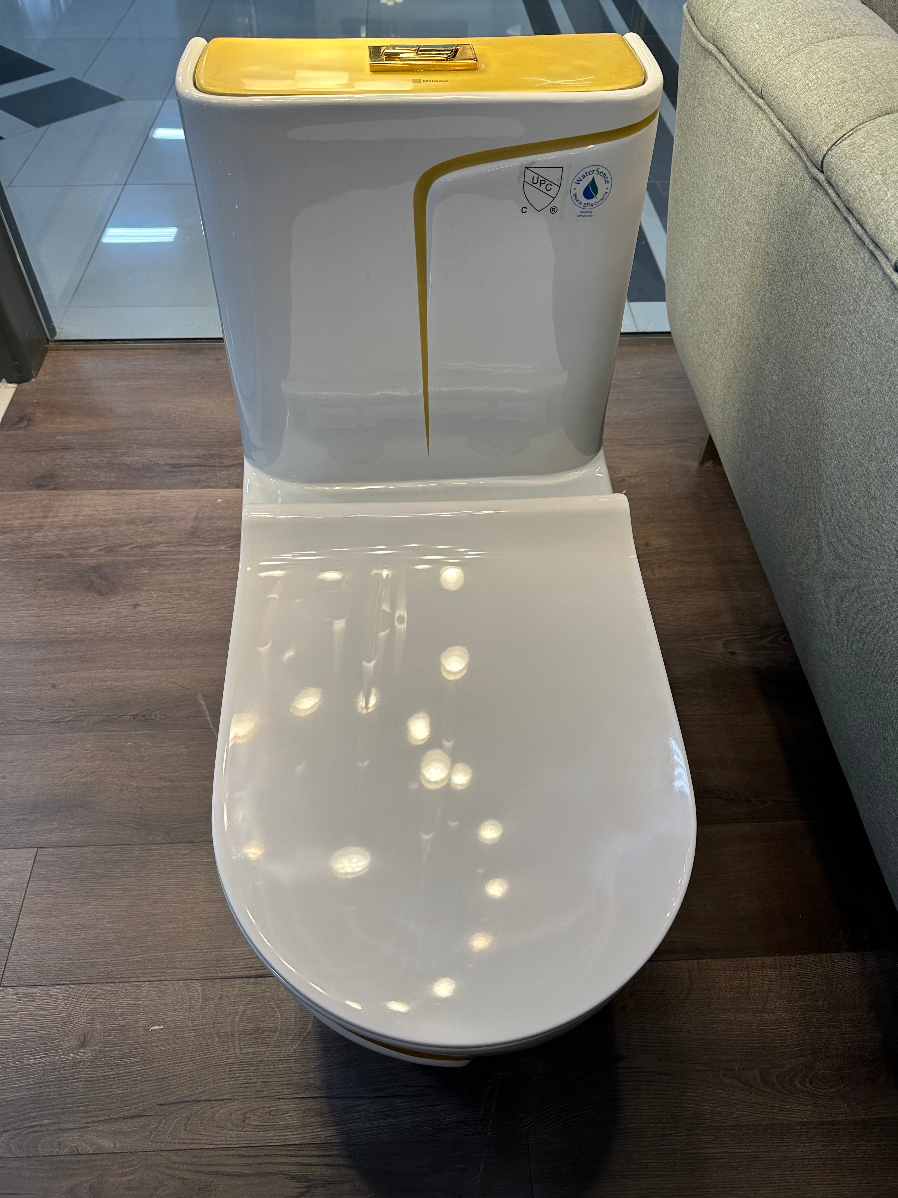One Piece Toilet Bowl SKU: 8676WG- Soft Close Seat with High Efficiency Dual Flush in White/Gold. Dual-Flush