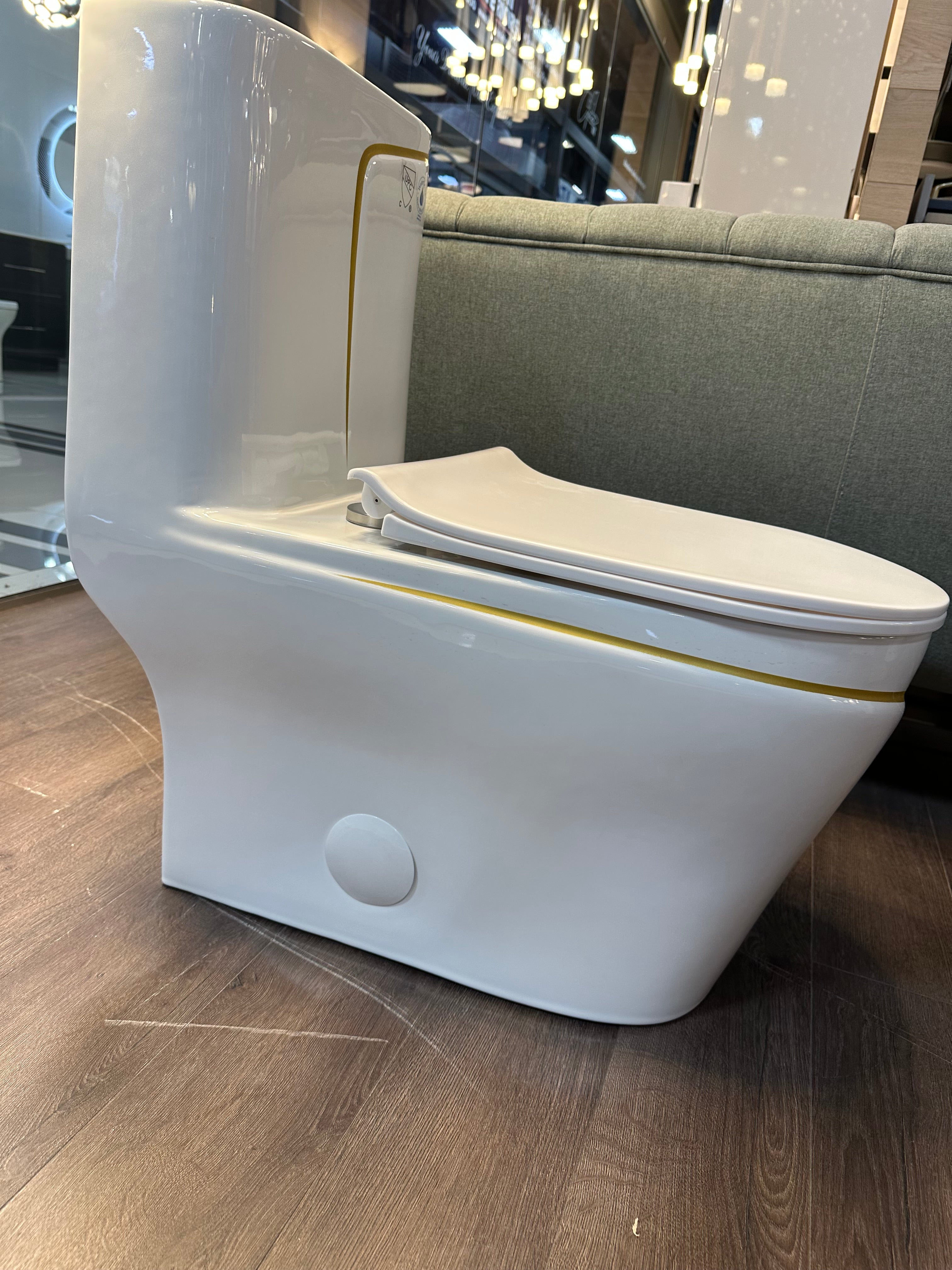 One Piece Toilet Bowl SKU: 8676WG- Soft Close Seat with High Efficiency Dual Flush in White/Gold. Dual-Flush