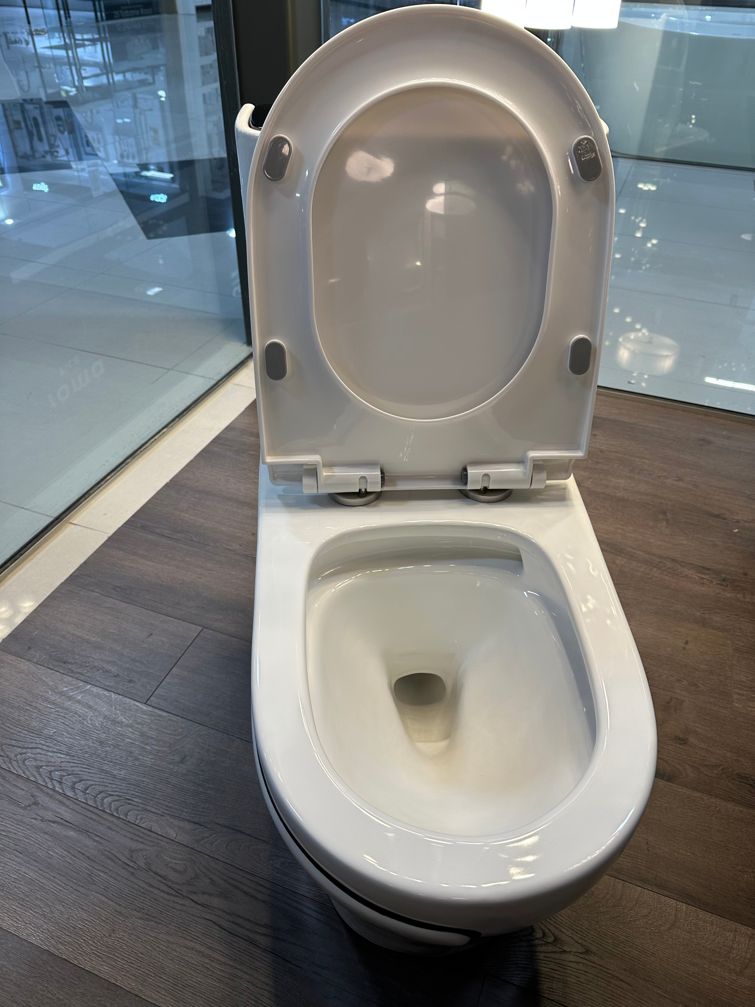 One Piece Toilet Bowl SKU: 8676WB- Soft Close Seat with High Efficiency Dual Flush in White. Dual-Flush