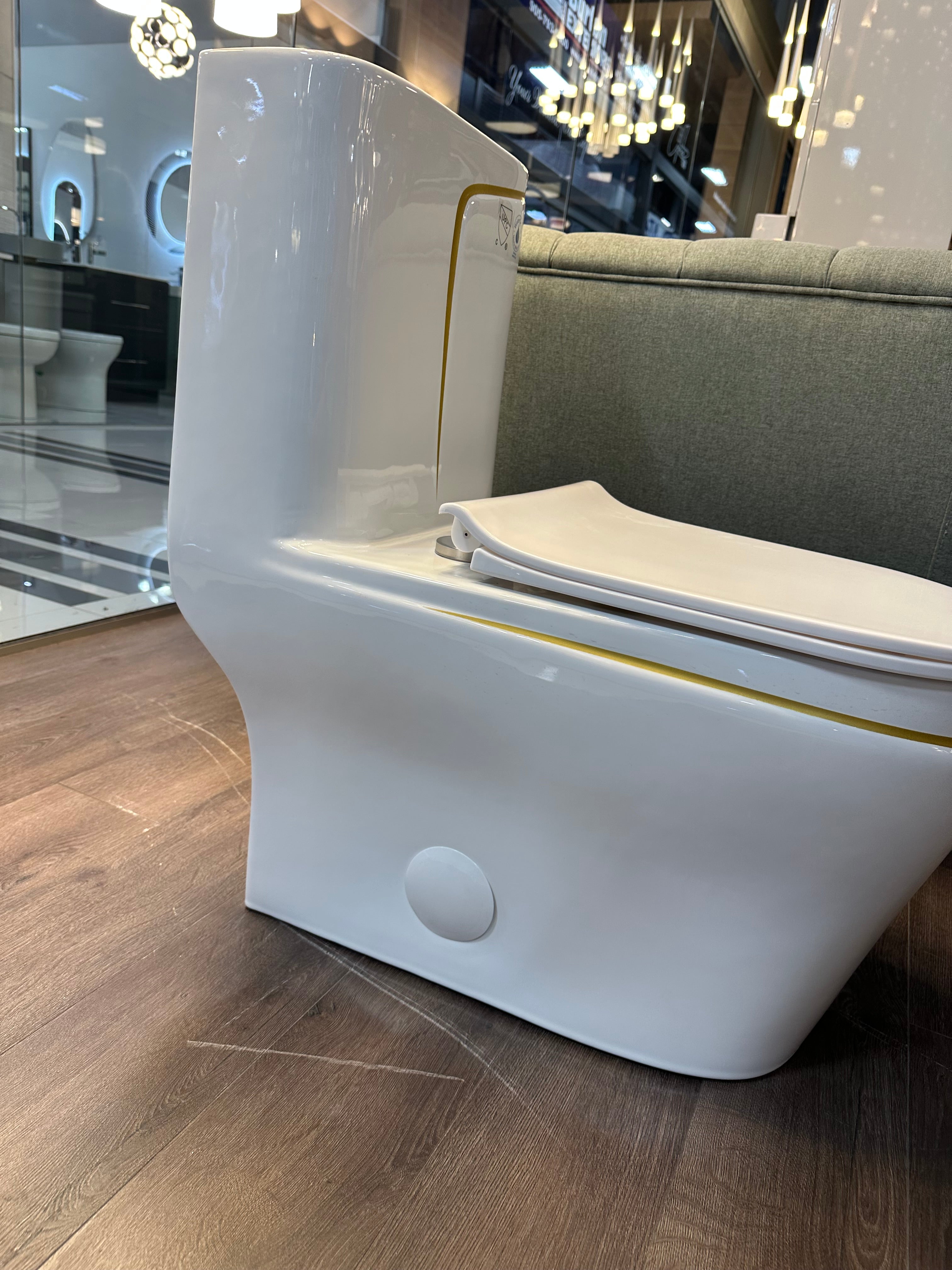 One Piece Toilet Bowl SKU: 8676WG- Soft Close Seat with High Efficiency Dual Flush in White/Gold. Dual-Flush