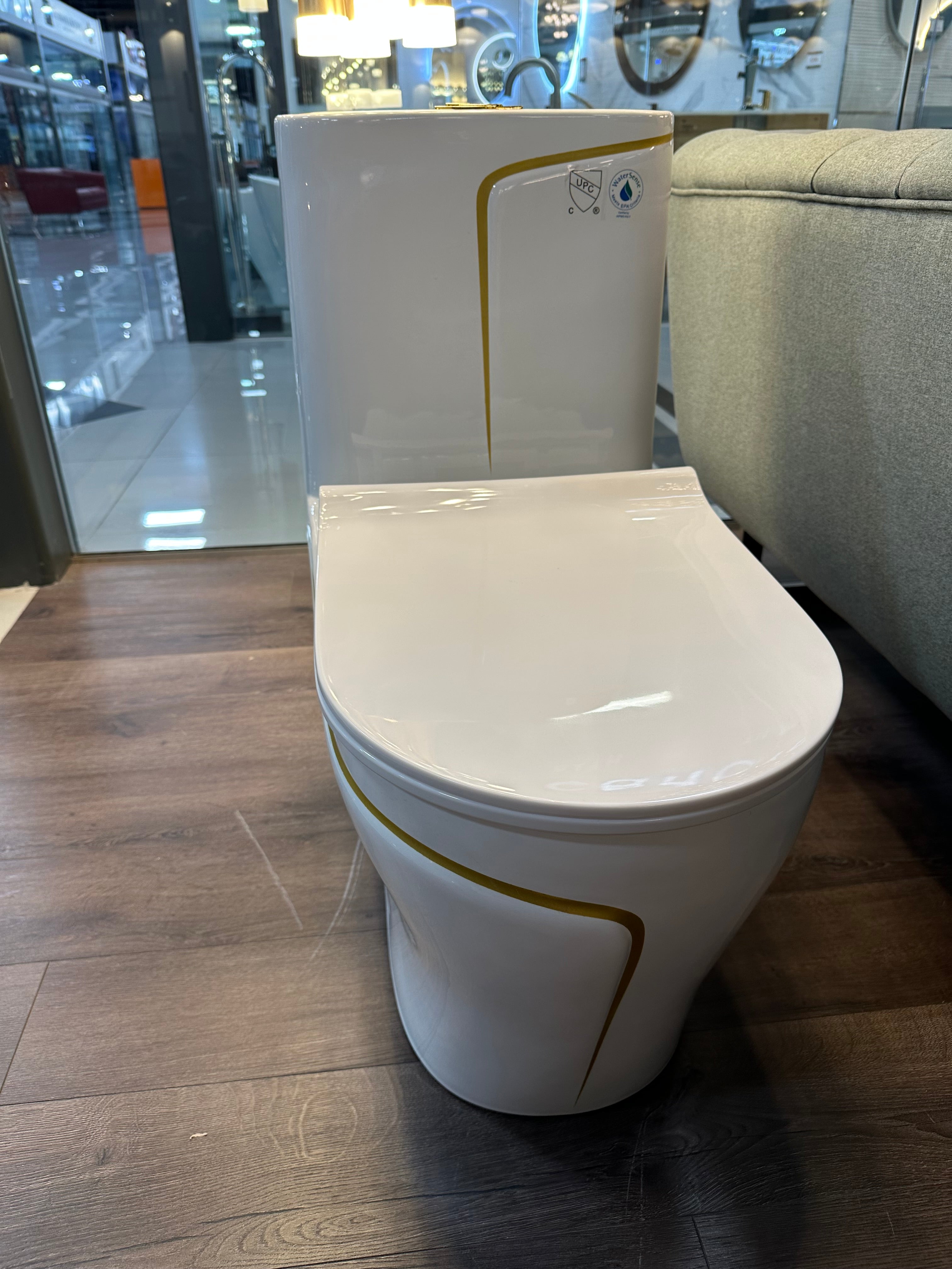 One Piece Toilet Bowl SKU: 8676WG- Soft Close Seat with High Efficiency Dual Flush in White/Gold. Dual-Flush