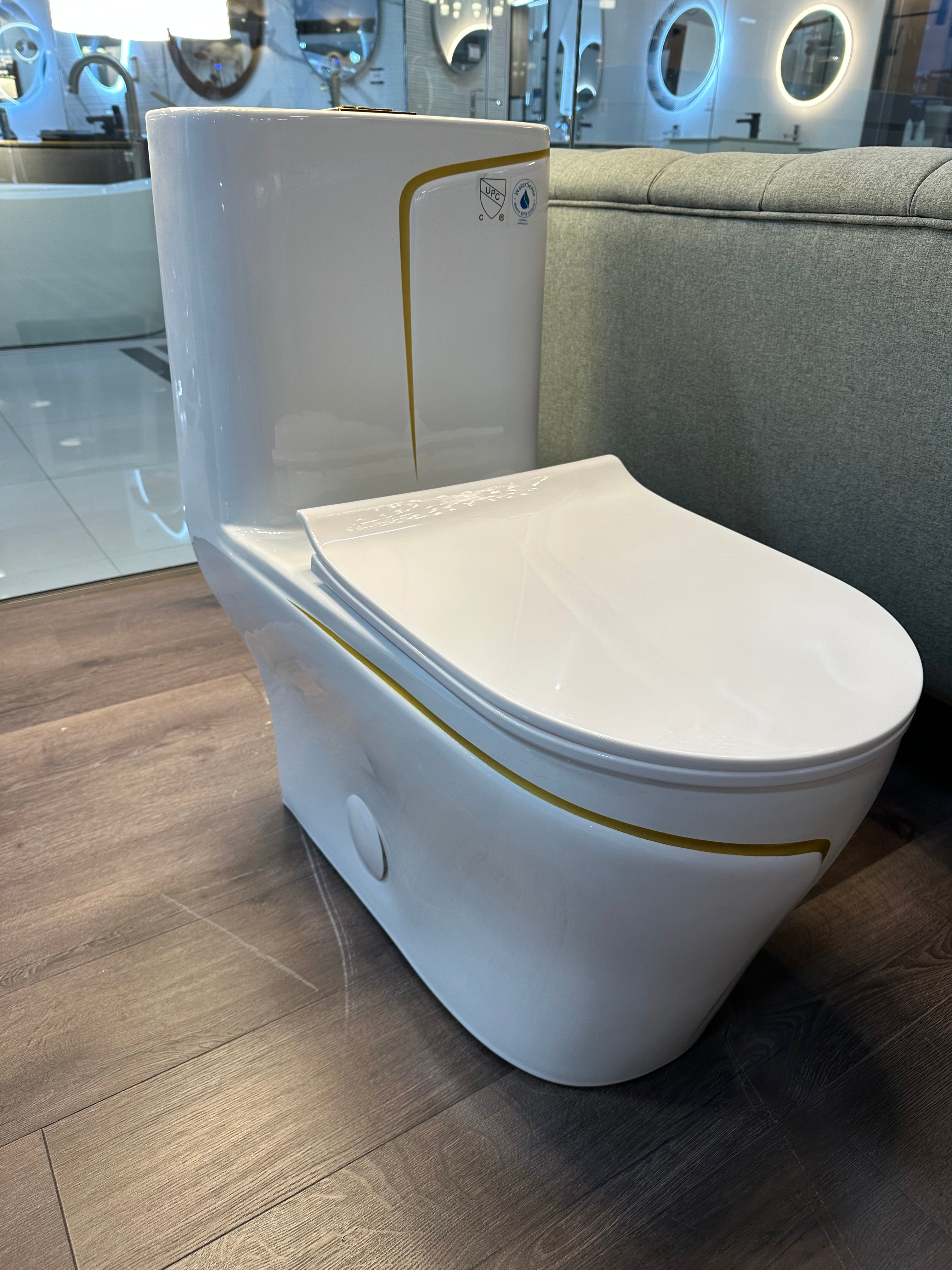 One Piece Toilet Bowl SKU: 8676WG- Soft Close Seat with High Efficiency Dual Flush in White/Gold. Dual-Flush